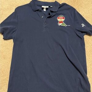 Lacoste Navy Polo with Colorful Embroidered Patch